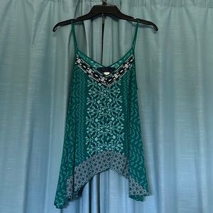 A loos green top from Francesca’s. The brand is Blue Rain